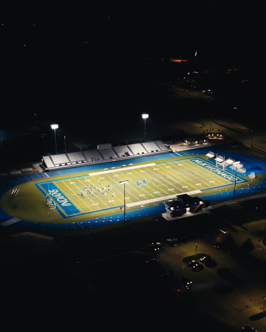 Drone view of Mukwonago’s stadium lit up at night